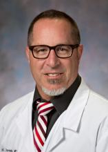 Dr. Curt J. Daniels