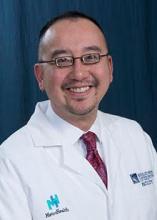 Dr. Henry Ng, an internal medicine physician and pediatrician in Cleveland