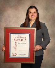 Dr. Narine Sargsyan of Alton (Ill.) Memorial Hospital, holds her Chairman's Award plaque.