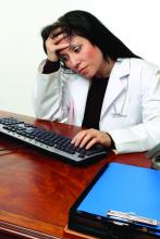 frustrated physician at computer
