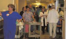 ﻿Staff scramble to treat victims in the ICU.