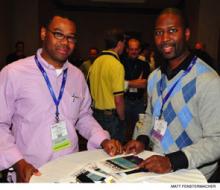 O'Neil Pyke, MD, FHM, of Mountain Top, Pa. (left) and Femi Adewunmi, MD, FHM, of Raleigh, N.C., members of the inaugural Fellows in Hospital Medicine class, take time out in the Fellows lounge at HM09 in Chicago.