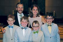 Kris Rehm, MD, with husband Christopher and children (from left) Lucas, Grant, Logan, and Jackson.