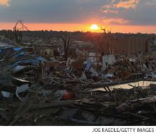 Debris from destroyed homes is seen after a massive tornado passed through the town on May 24, 2011 in Joplin, Missouri.