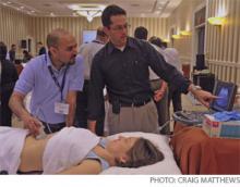 Faculty member Joshua D. Lenchus, DO, FHM, (right) instructs Syed Irfan Qasim Ali, MD, (left) in proper ultrasound techniques on acting-patient Kristin Wish, MD, during the hands-on procedures course.
