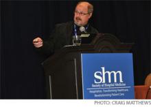Thomas Ziegler, MD, points to his presentation during the “Comprehensive Critical Care in 2010” pre-course at HM10.