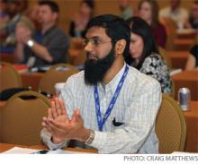 Mateen Dawood, MD, applauds an HM10 speaker.