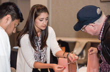 Alyssa Burkhart, MD, provides training during the bedside procedures course. 