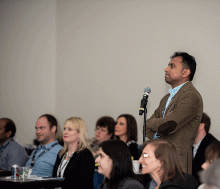 Anand Kartha, MD, asks a question during a breakout session
