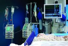 A patient in an intensive care unit room